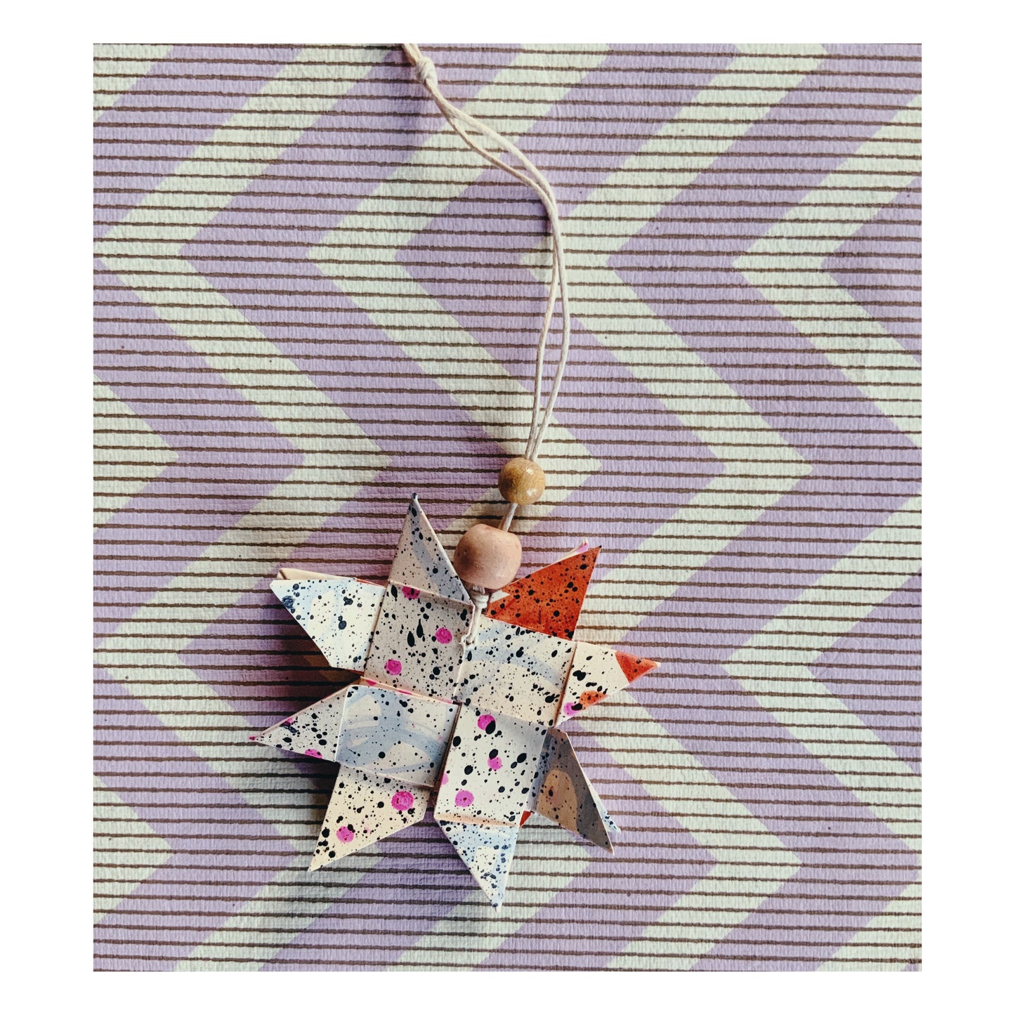 Justjärna i papper #9