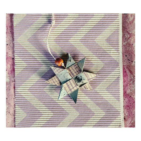 Justjärna i papper #10